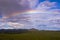 Rainbow over Dempster Highway and Richardson mountains