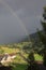Rainbow over Farmhouses