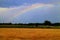 Rainbow over field near small town Stupava, ZÃ¡horie