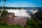 Rainbow over gorgeous waterfalls of Iguazu, Brazil