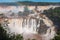 Rainbow over gorgeous waterfalls of Iguazu, Brazil