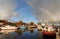 Rainbow over harbor in Zoutkamp