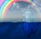 Rainbow over Iceberg in ocean