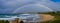 Rainbow over Kiama, NSW, Australia, view across Bombo beach