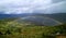 Rainbow over the lower hilltop village, aerial view from Kuelap Fortress in Amazonas region, northern Peru