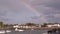 A rainbow over a pier in Ireland