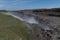 Rainbow over the powerful waterfall Dettifoss in Iceland