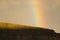 Rainbow over a ridge of the Tirajana crater.