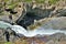 Rainbow over river downstream of Godafoss waterfall