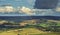 Rainbow over Scenic Countryside Fields in UK