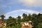 Rainbow over a small hani village