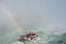 Rainbow over tour boat Niagara Falls