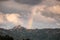 Rainbow over village of Sant`Antonino in Corsica