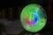 The rainbow physical bitcoin coin is BTC, preferably color green.