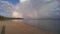 Rainbow in picturesque Caribbean beach scenery in the morning