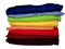 Rainbow pile of clothes on white with path