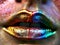 Rainbow pride lips painted for healing and harmony.