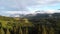 Rainbow after rain in mountain nature above the forest