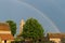 Rainbow after the rain over the church in TaizÃ©, France