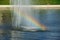 Rainbow in river fountain
