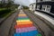 Rainbow road leading to the church in the small town of Seydisfjordur in East Iceland