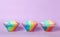 Rainbow shaving ice in glass dessert bowls on background