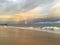 Rainbow in Sky above Pacific Ocean during Sunset on Kauai Island in Hawaii - View from Beach in Kekaha.