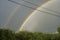 Rainbow in the sky. Beautiful background with colorful rainbow.