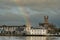 Rainbow in the sky over Limerick City District Court building and St Mary`s Cathedral. Ireland. River Shannon. Popular town
