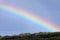 Rainbow in the sky after summer rain