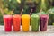 Rainbow from smoothies. Watermelon, papaya, mango, spinach and dragon fruit. Smoothies, juices, beverages, drinks