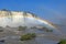 Rainbow Spanning the Rapids Beneath the Falls