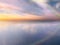 Rainbow sunbeam  on blue sky sunset on sea water reflection  nature landscape background  summer template