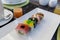 Rainbow Sushi Roll with salmon, eel, tun, royal prawn, caviar