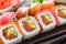 Rainbow sushi roll with salmon, tuna and eel