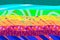 Rainbow textured hand drawn background abstract in vibrant colors
