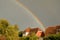 Rainbow in threatening skies during storm Brian in UK