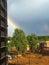 Rainbow after a thunderstorm over a city courtyard