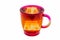 A rainbow transparent glass mug in warm red and orange colors with brown tea is on a white background