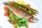Rainbow trout with asparagus and cherry tomatoes