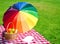 Rainbow umbrella, book and Picnic basket