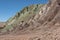 Rainbow Valley Valle Arcoiris, in the Atacama Desert in Chile. The mineral rich rocks of the Domeyko mountains give the valley t