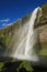 Rainbow and waterfall Seljalandsfoss in Iceland