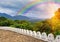 rainbow and white stone fence in Buddha Rock temple in Dambulla, Shri Lanka