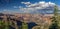 Rainclouds over a wide Grand Canyon landscape