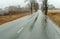 Raindrops on car glass, wet asphalt, rain on glass, drive on highway in heavy rain
