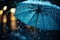 Raindrops splash on the umbrella, depicting a concept of rainy weather