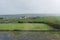 Raindrops on a window, country landscape