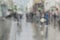 Raindrops on window glass, people walk on road in rainy day, blurred motion abstract background. Concept of shopping