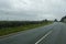 Raindrops on the windshield. Road photo